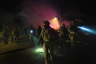 U.S. federal agents, including ICE, during an operation in Minneapolis, in January. Credit...David Guttenfelder/The New York Times